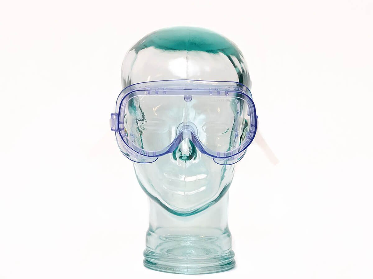Front view of VWR indirect-ventilation disposable safety goggles on a display head