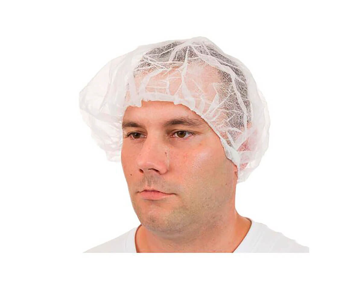 Man wearing an International Enviroguard white 19-inch polypropylene bouffant cap