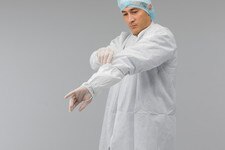 1700 MP protective sleeve with elastic cuff, worn for arm protection