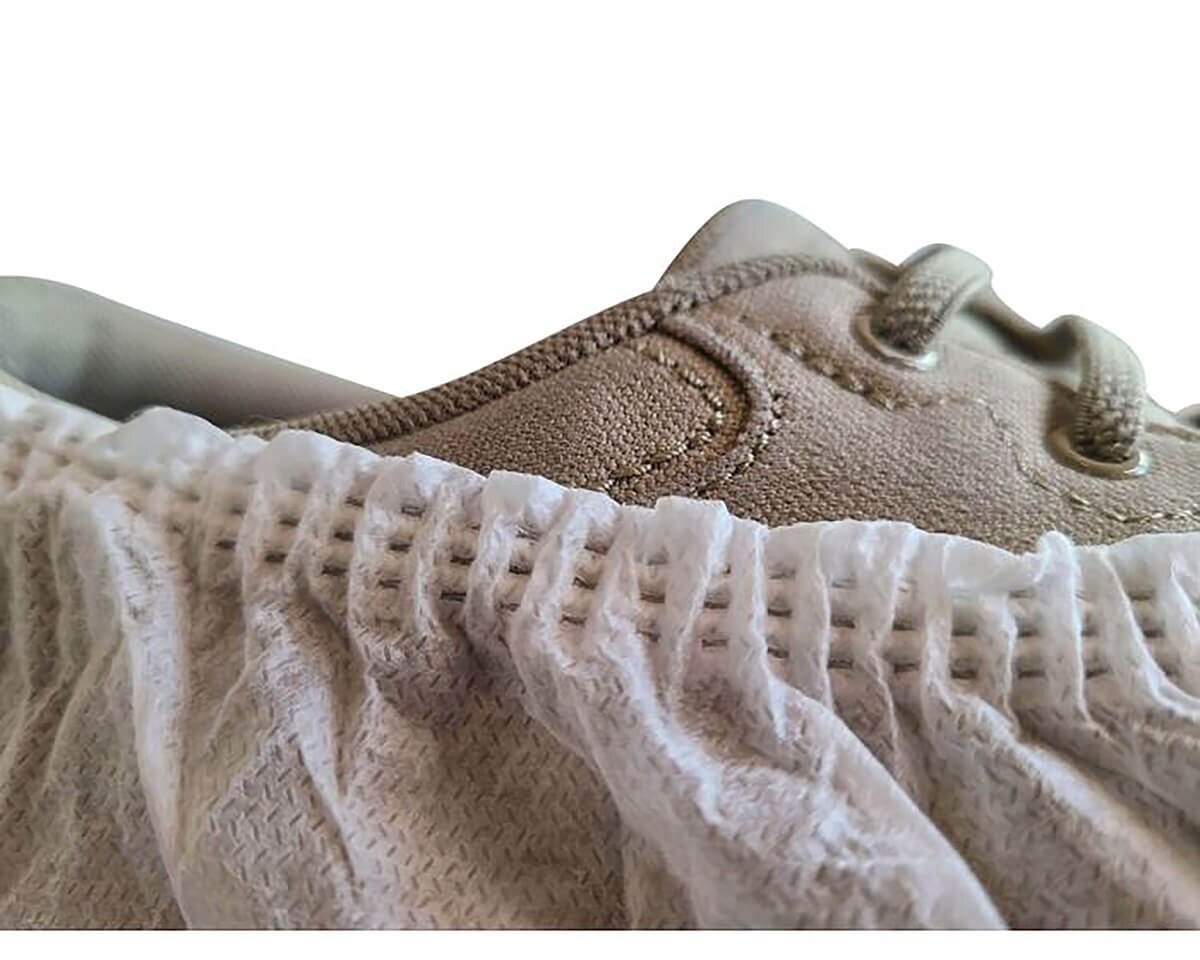 Close-up of the International Enviroguard SMS shoe cover’s secure latex-free elastic opening