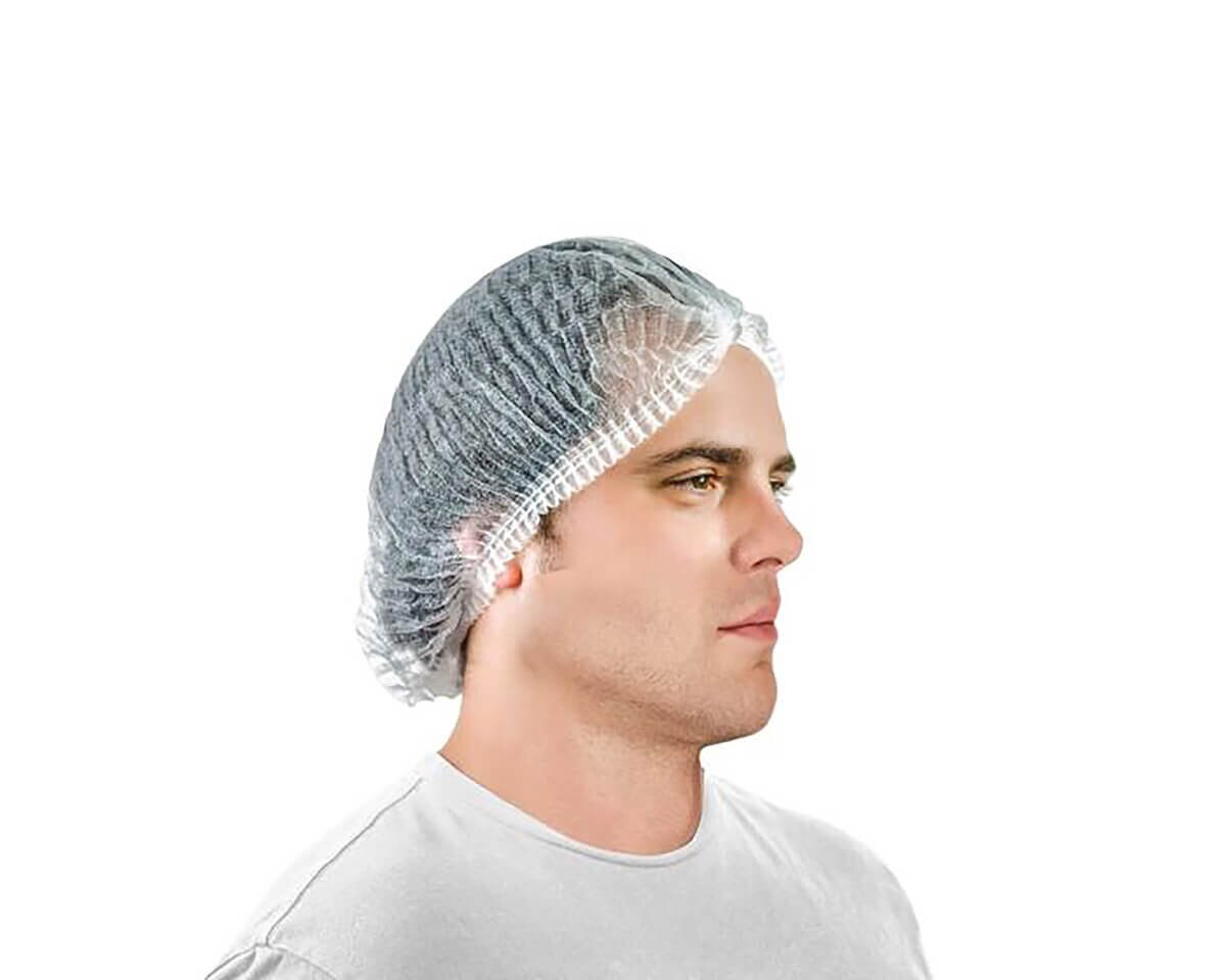 Man wearing an International Enviroguard white 21-inch SMS pleated bouffant cap