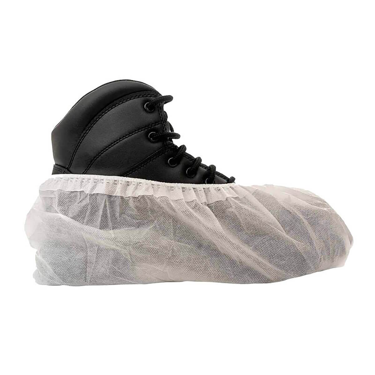 Single International Enviroguard FirmGrip large laminated non-skid shoe cover worn over a black work boot