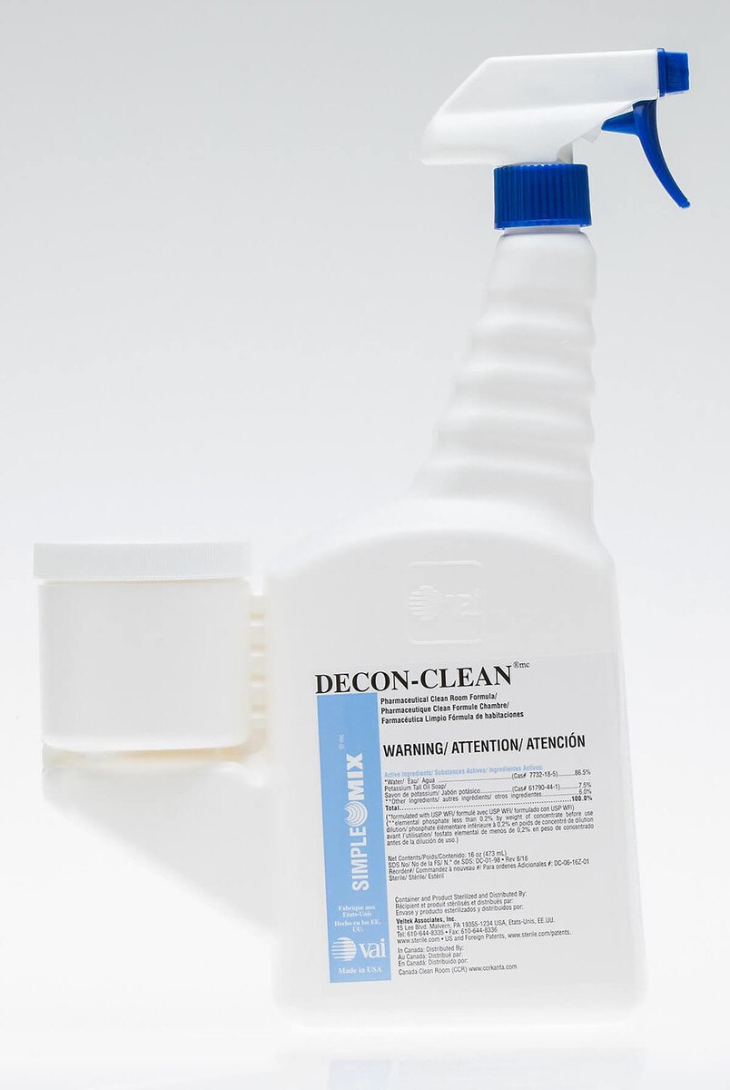 Single DECON-CLEAN trigger spray bottle with blue nozzle, front-label visible and attached dosing chamber on left side.
