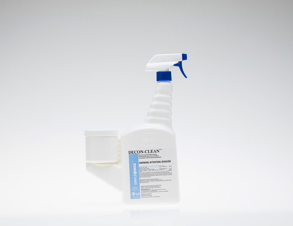 Single DECON-CLEAN trigger spray bottle with blue nozzle, front-label visible, positioned on white surface.