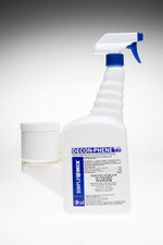 Cut-out image of Decon-Phene 16oz sterile trigger spray bottle with blue nozzle and attached measuring cup.