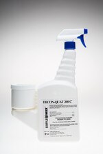 Decon-Quat 200C 16oz trigger spray bottle standing upright on a clean white background, showing the front product label and attached measuring chamber
