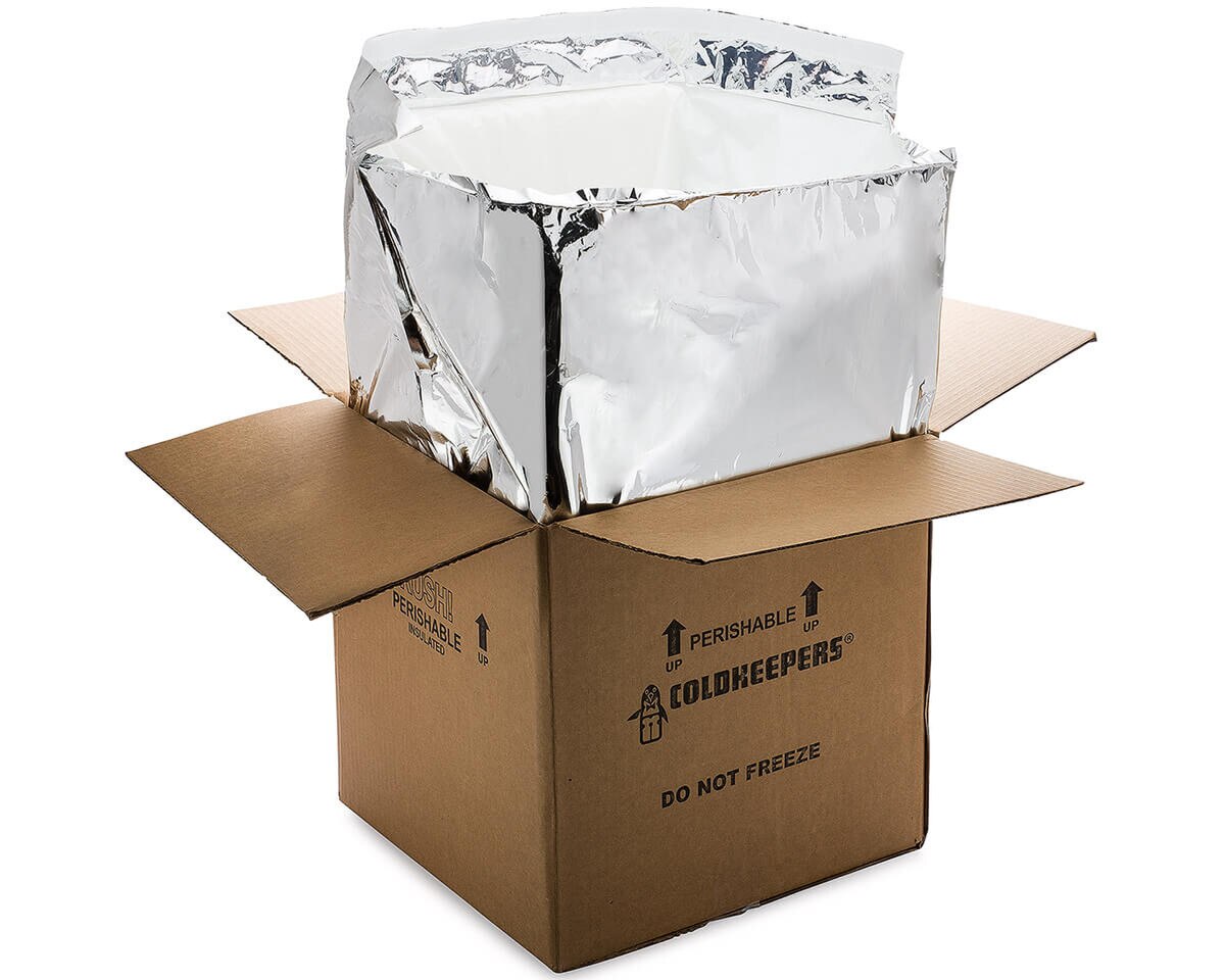 Coldkeepers Kold-To-Go 14 Cube Extreme polyurethane liner in an open corrugated shipping box