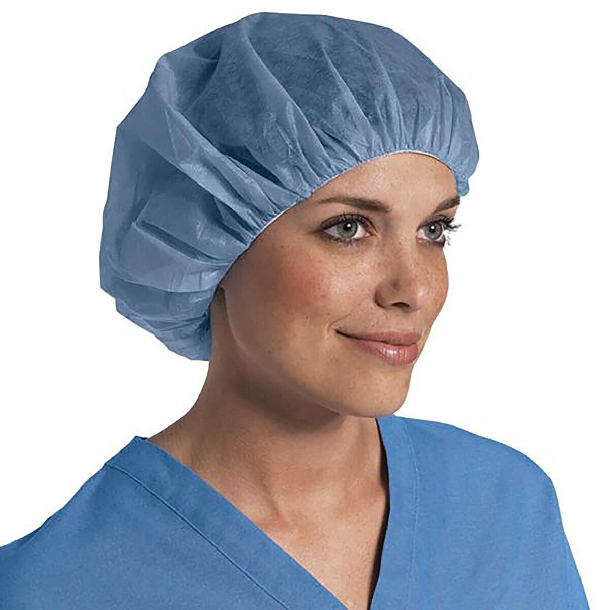 Healthcare professional wearing a Medline Pro Series lightweight blue 24-inch polypropylene bouffant cap