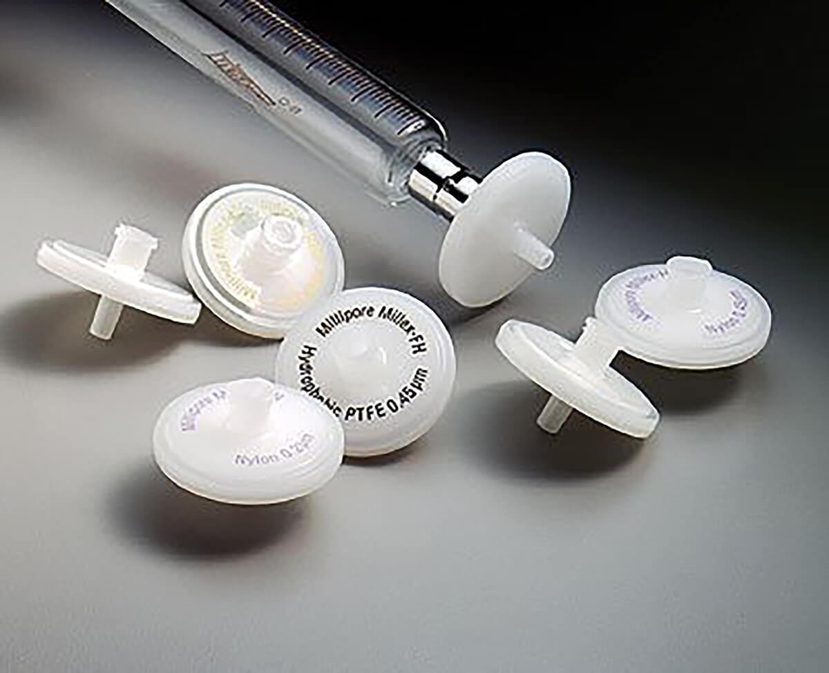 MilliporeSigma Millex syringe filter family shown with a syringe for laboratory solution and sample filtration