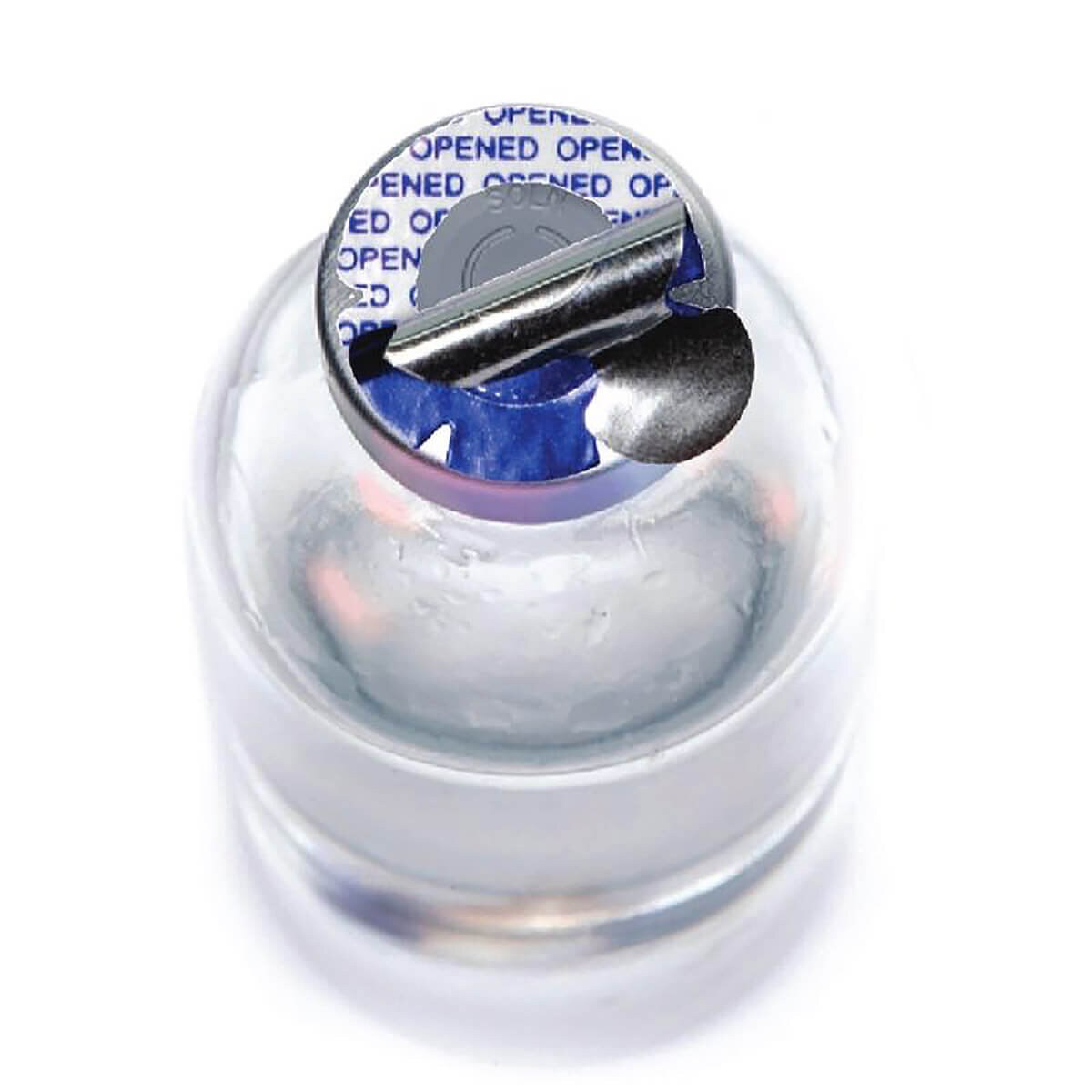 Close-up of an opened Steri-Tamp blue vial seal showing tamper evidence