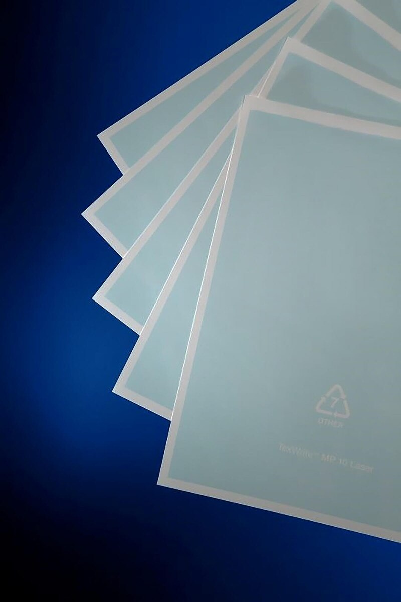 Fan of Texwipe TexWrite MP10 blue-and-white synthetic cleanroom paper sheets showing the contrasting sides, 8.5 × 11 inches