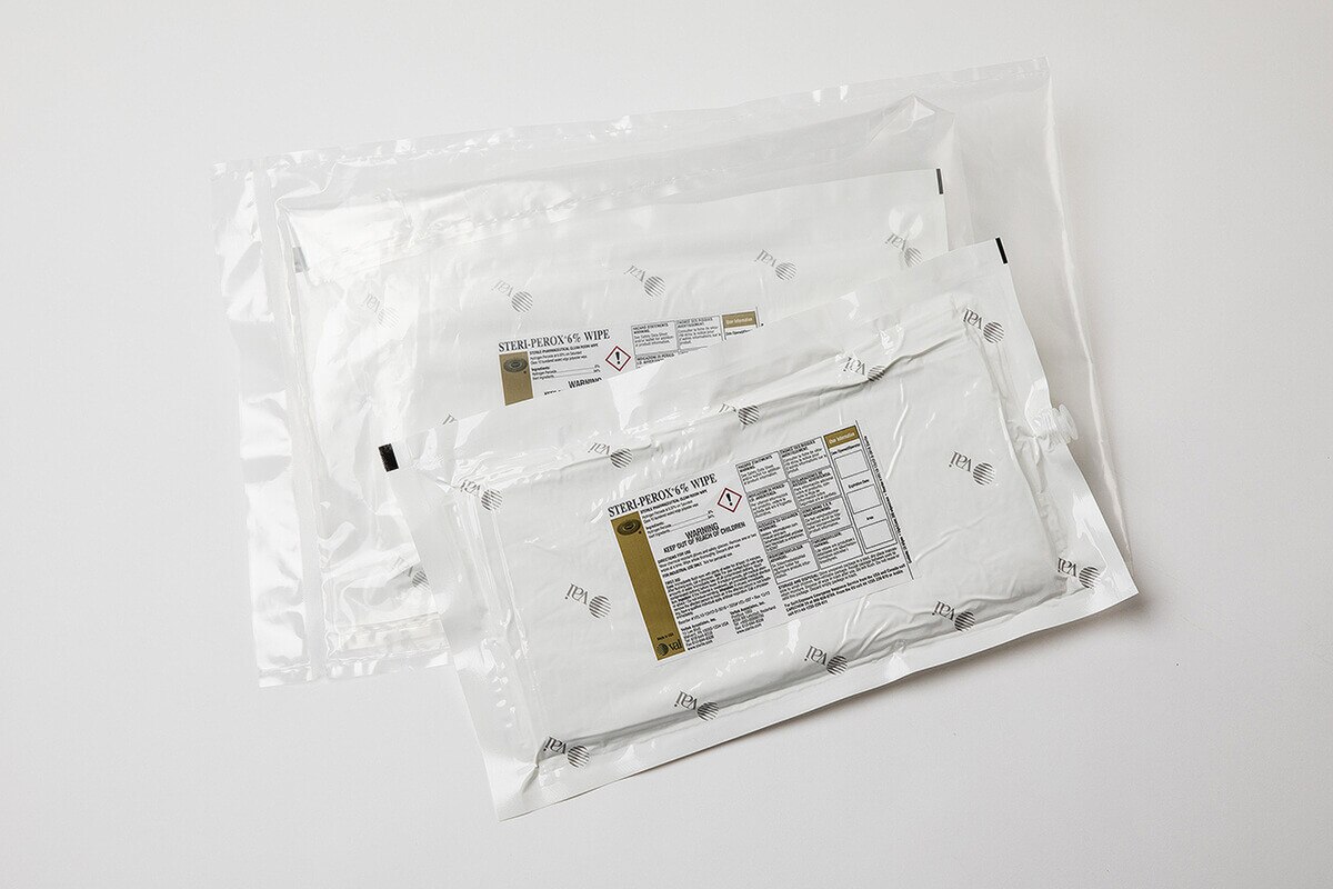 Multiple Steri-Perox 6% hydrogen peroxide wipe packs in sterile double-bag packaging, designed for controlled cleanroom environments.