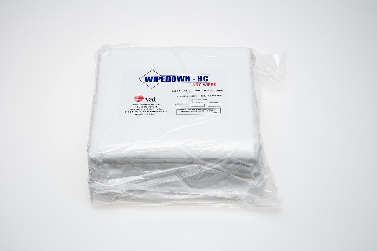 Full wrapped bundle of WipeDown HC dry blend wipes stacked inside clear sterile poly packaging with product label visible on front